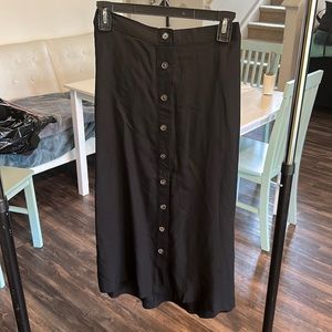 MIDI skirt; black with brown buttons